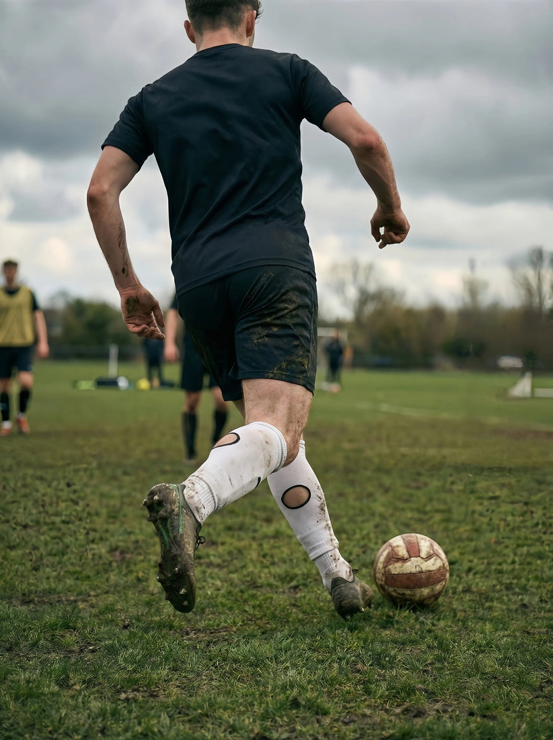 Football player wearing modern performance football socks for 2026 style and innovation