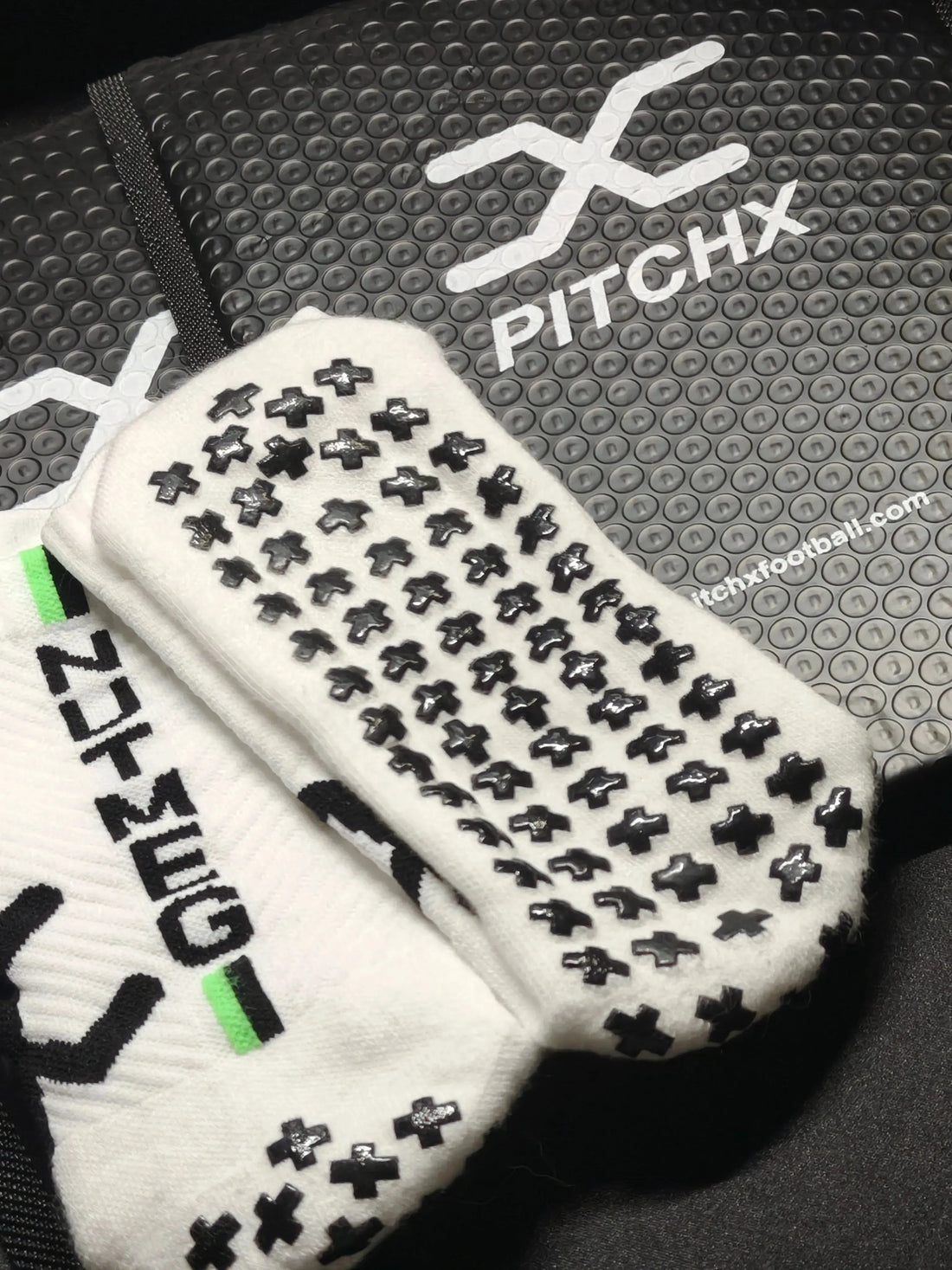 Anti-slip football socks with grip details for stability and comfort during football