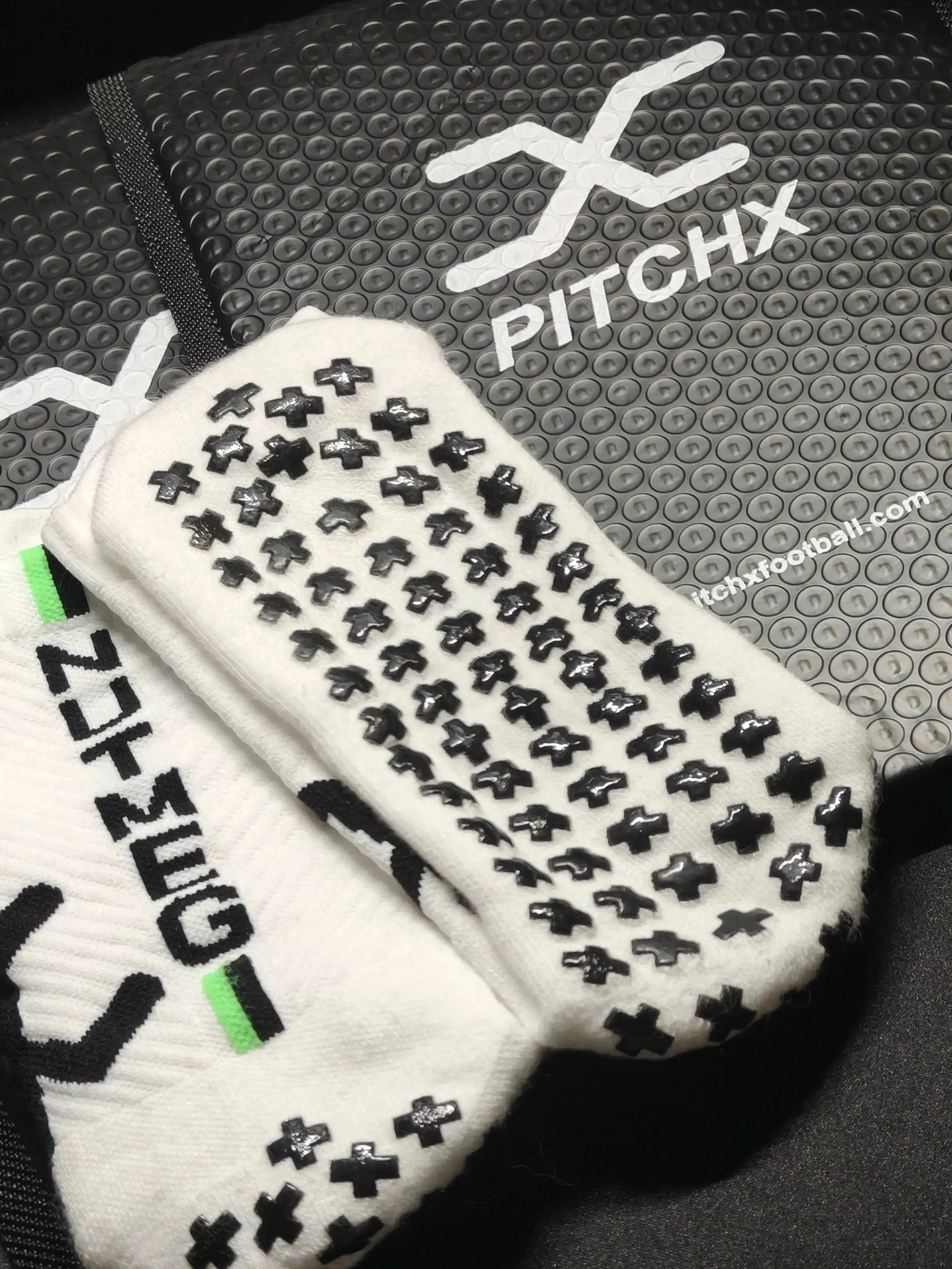 Anti-slip football socks with grip details for stability and comfort during football